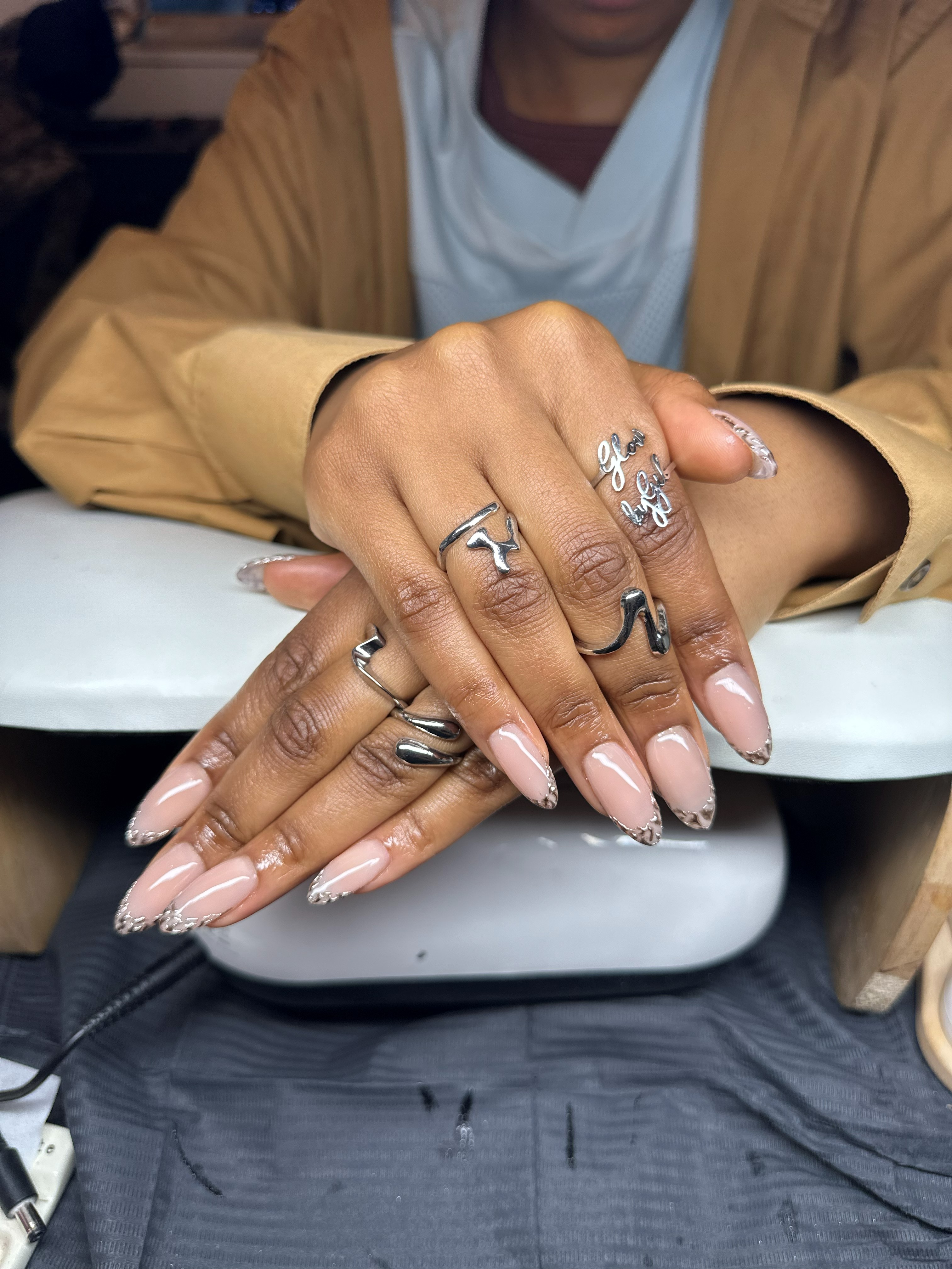 Nude nails with silver chrome tips